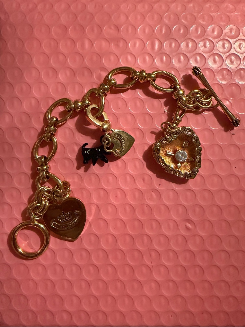 Gold Juicy Couture charm bracelet
